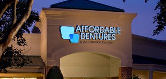 Affordable Dentures Sign at Night